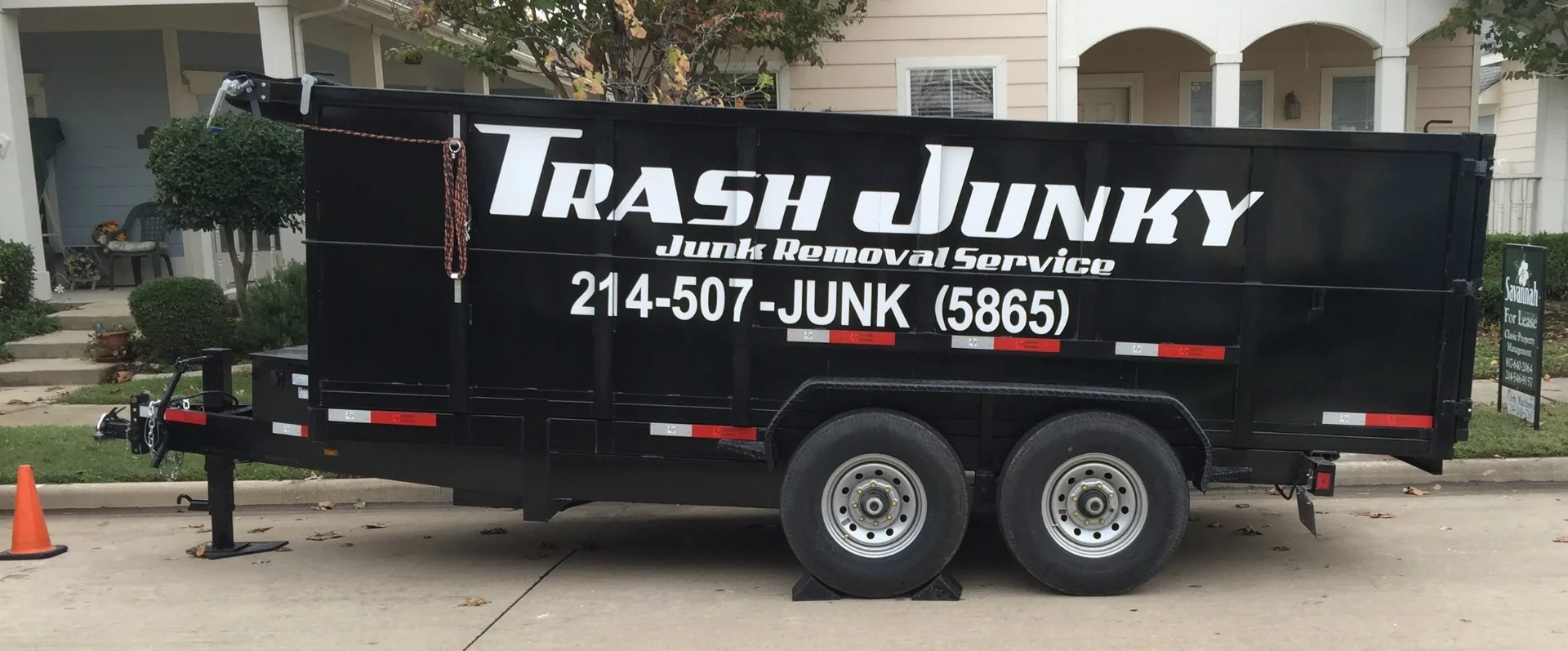20 cubic yard open-top dumpster in a residential driveway